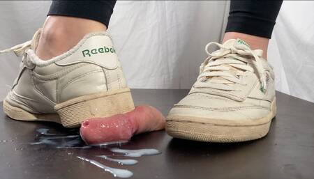 A Reebok Classic Shoejob - Tramplegirl crushes the cum out of his cock with the heel of her Reebok Club C85 Vintage sneakers - Footjob, CBT and Sneakerfetish