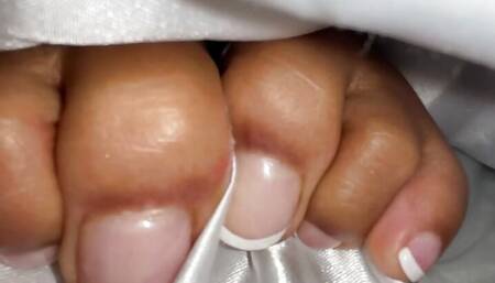 Ebony Girl Under Her Covers in Bed Show off Feet