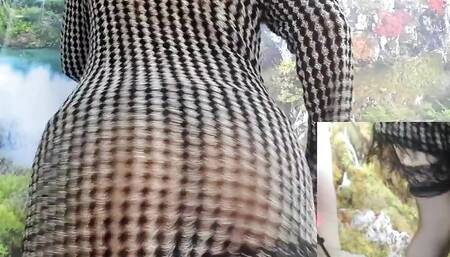 In a Silver Dress with a Perfect Ass, She Fucked Herself with a Dildo on Camera