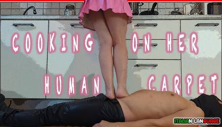Cooking on her human carpet - MOBILE