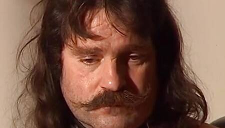 Nasty Master spanks the hell out of this horny German couple