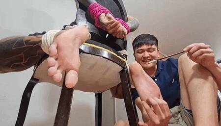 Chair tied my friend's ankles and feet to Tickle him using different tools non stop