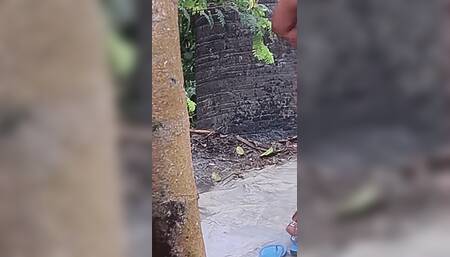 Sexy Bhabhi Bathing in Open Bathroom