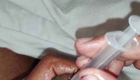 Srilankan younger boy oil injection to he Big Penis and hand job in oily Penis