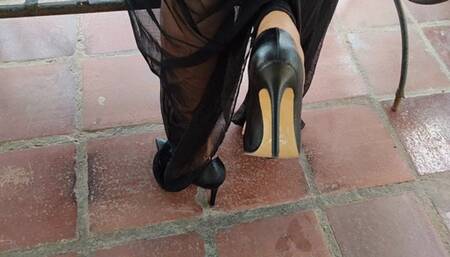 Pronounced arched feet when walking in stiletto heels and left dangling (1)