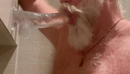 DaddybearAZ deep throats a dildo in the shower