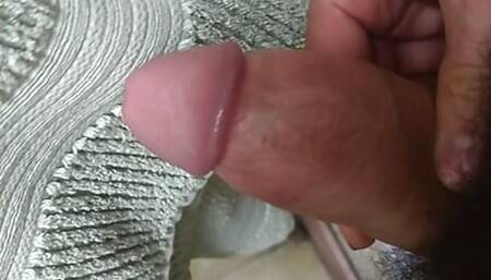 Jerking off, moaning loudly and ejaculating in the bathroom.