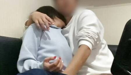 A cute, short girl sucks her boyfriend's penis while drooling.