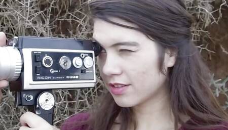 Lovely hairy brunette babe masturbates at the seashore