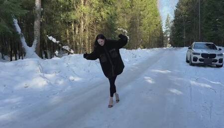 Black high heels mules on ice, slippery high heels, ice walking, slippery shoes, girl on ice