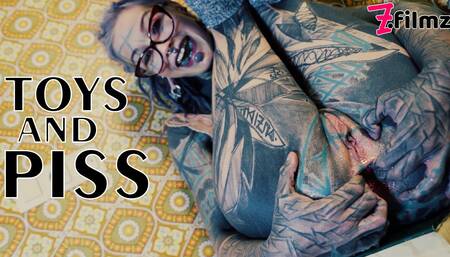 Inked babe Anuskatzz fucks both of her tight holes