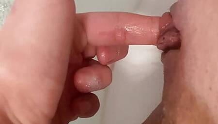 Fingering my tight wet virgin pussy in bath during my red days.Wet pussy sounds and close up