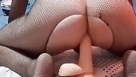 Sitting on the big dildo and skinning to the bottom, no mercy