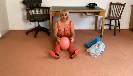 Balloons in a red bodystocking