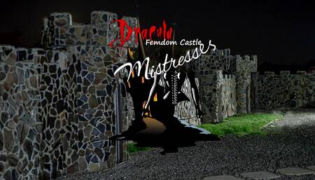 Extinguishing the cigarette on the prisoners balls - Mistress Zeida and Mistress Alexandra