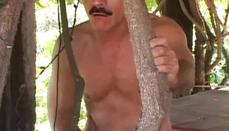 Slutty brunette invites the peeping gardener over and takes his cock up her ass outdoors