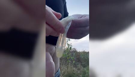 Used condom with sperma in the forest