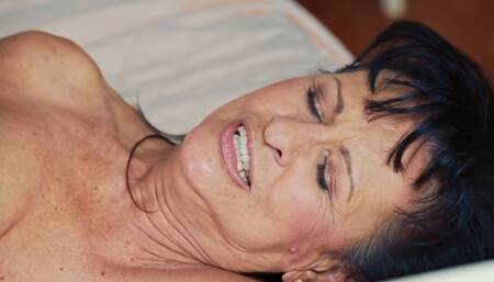 Skinny lad with a big dick handles a GILF like a champ