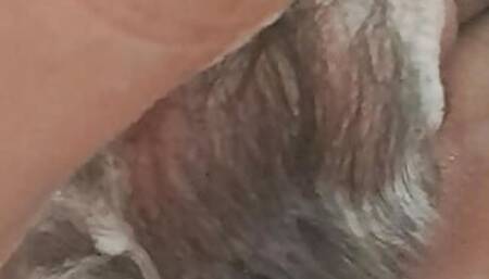 Mature milf washing her hairy pussy