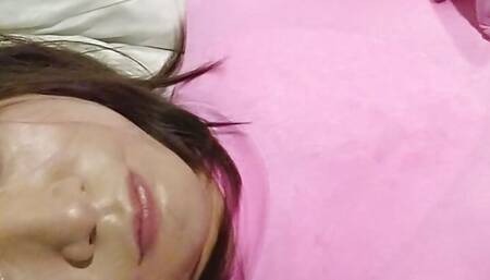 Cross-dressing boy masturbates in pink full-body tights