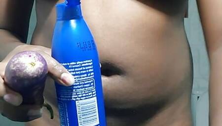 Hot girl fucking with eggplant in bathroom