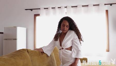 Spanish teen beauty with curly hair solo