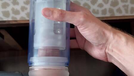 Sex toy review: shooting my thick load in a blowjob  simulator with suction and rotation on my uncut cok