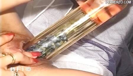 DVD Blonde milf in her extreme insertion solo game