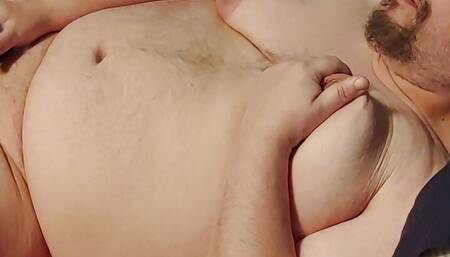 Chubby guy pinches nipples and cums
