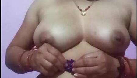 Desi bhabhi masturbation her pink pussy and fucking her pussy with a oil bottle