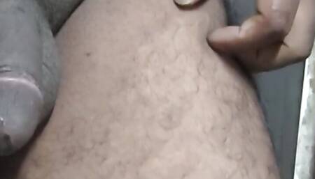 Desi boy shakes penis in bathroom