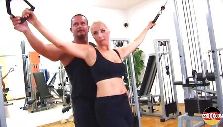 Fit Blonde Babe Working Out a Hard Cock in the Gym