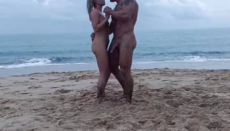 Romantic Dance of a Naked Couple on a Beach