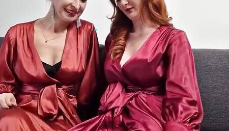 We present their new video, in which they both are wearing red sating gowns, nylon seamed stockings