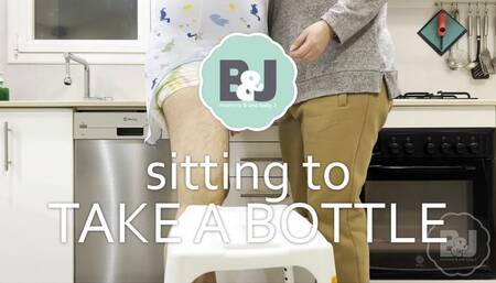 Sitting to take a bottle