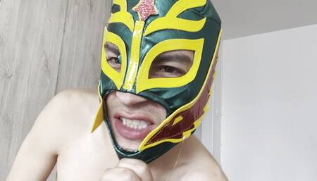 Latin gay guy models his mask and makes a spectacular show