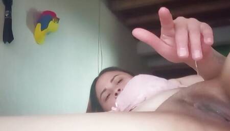 Woman with tattoos masturbates alone in her room