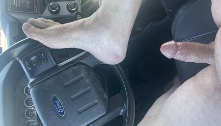 Extreme edging in truck in public parking lot. People and traffic all around me.