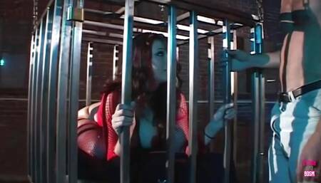 A brunette in a cage deepthroats and sucks a cock in order to be free
