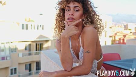 Spanish latina MILF balcony striptease