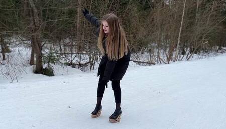 Platform on snow, wooden shoes walking on snow, girl walking on snow, high heels on snow