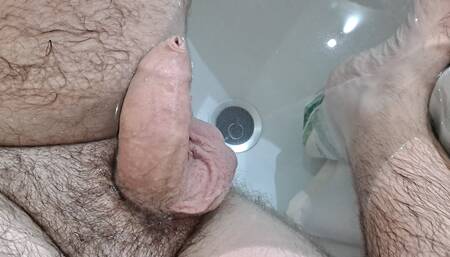 Hairy bear masturbates while bathing