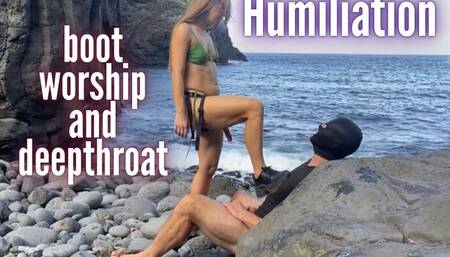 Humiliation slave on a beach with training his throat, spanking and boot worshiping