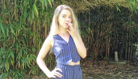 Smoking outdoors with lipstick