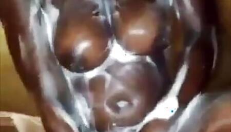 Sexy African Girl with Big Natural Tits Fucking a Bottle in the Shower..