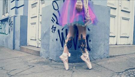 Ballerina Wearing Ballet Shoes and Walking Down The Street