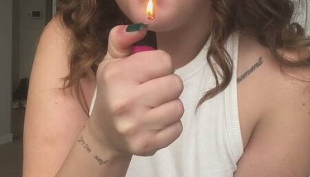 Sexy brunette with big tits smokes