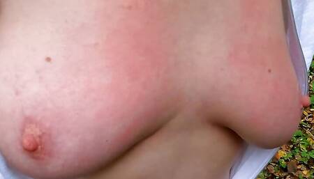 Hard naked pussy and titslapping lying on the woodpile