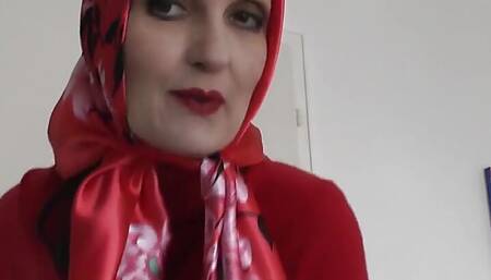 Lady Victoria Valente Showed Elegant Satin Headscarves with a Red Cashmere Turtleneck Sweater