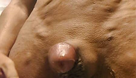 Fit bald muscular guy jerks off his pierced cock